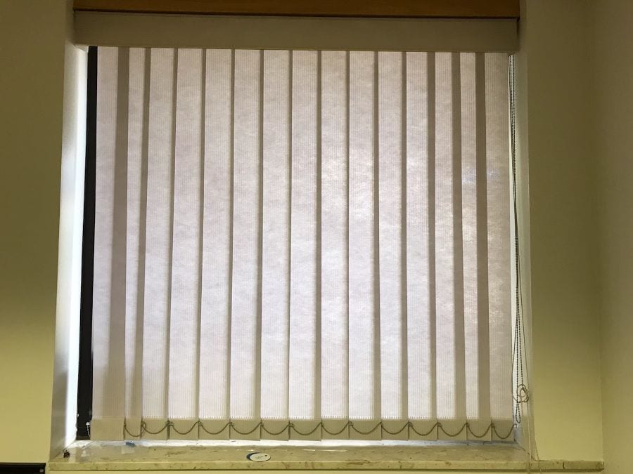 5 Smart Ways to Keep Vertical Blinds From Blowing in the Wind