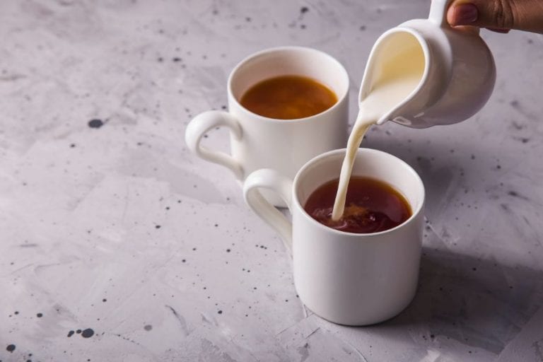 Pouring Milk in Tea