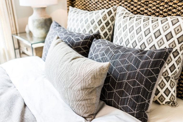 Decorative Pillows on a Bed