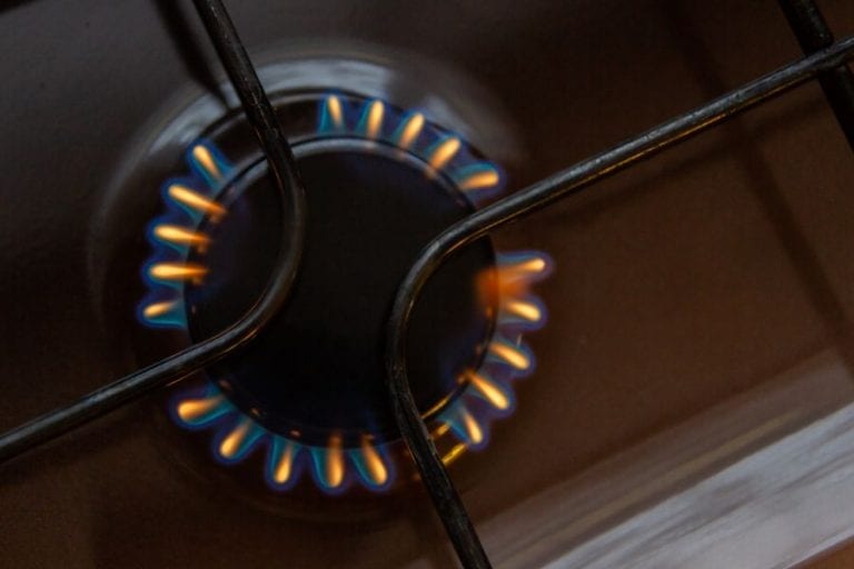 Why Is My Gas Stove Flame Orange? (And What to Do)