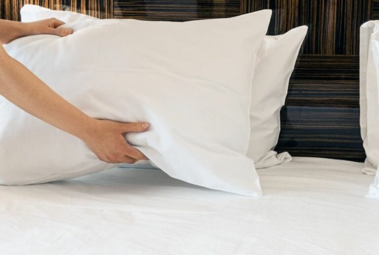 5 Smart Ways to Keep Feathers From Coming Out of Pillows