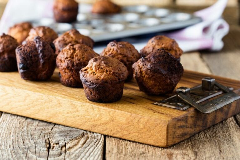 Burnt Muffins on Wood Table