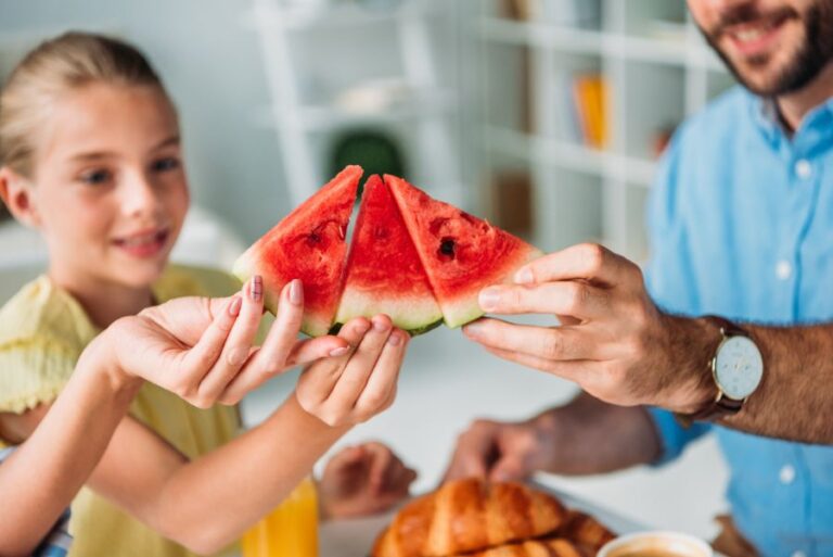 Family Eating Watermelon