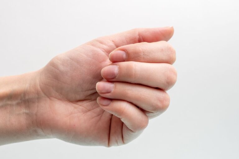 Closeup of Female Hand With Clean Nails