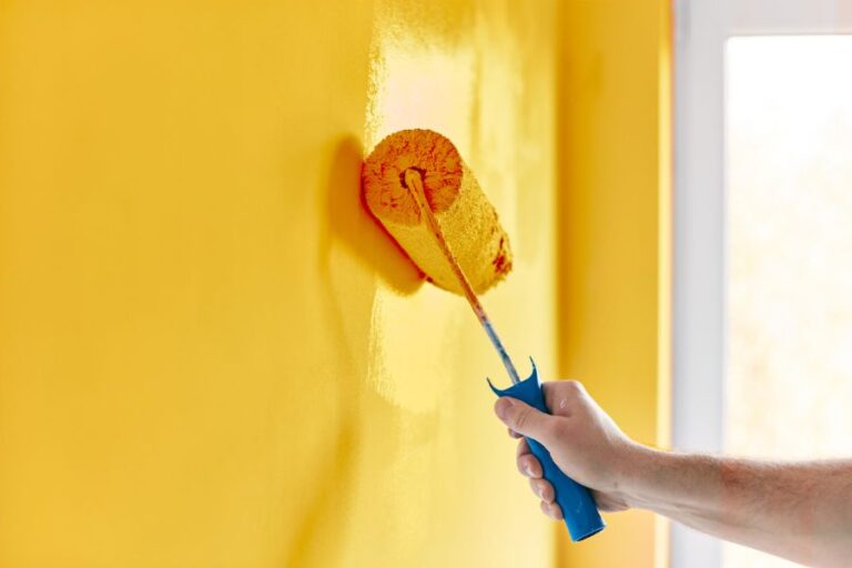 Painting a Wall Yellow With a Paint Roller