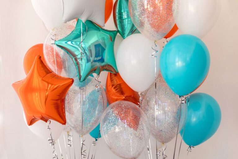 Lots of Orange, Silver, and Blue Helium Balloons