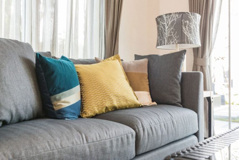 Colorful Pillows on a Modern Gray Sofa
