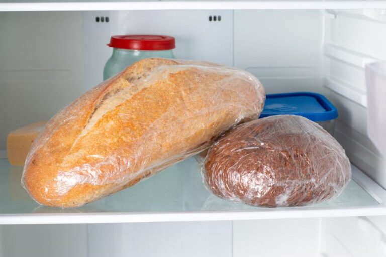Loaves of Bread on a Shelf in the Refrigerator