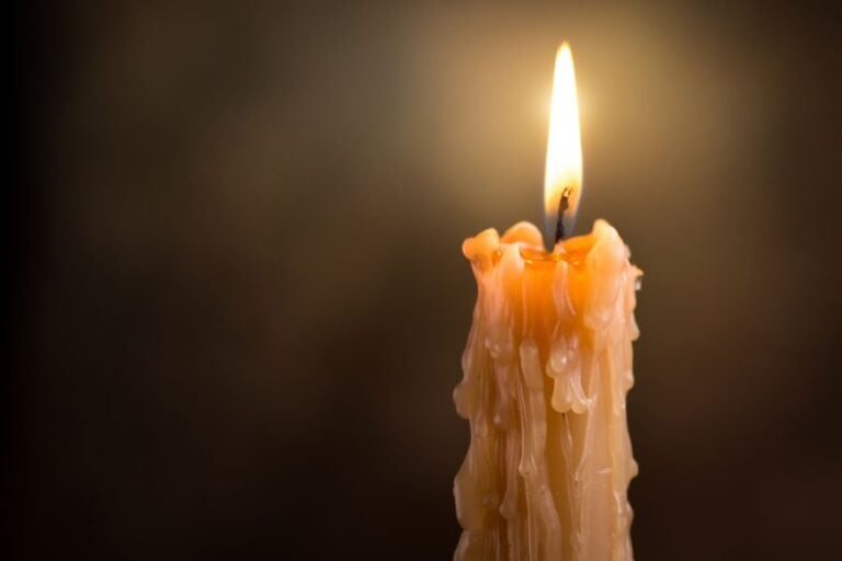 Candle Taper Burning Down With Wax Drippings Down Sides