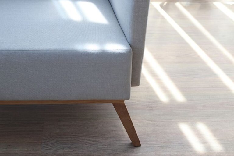 Closeup of a Couch With Wooden Legs