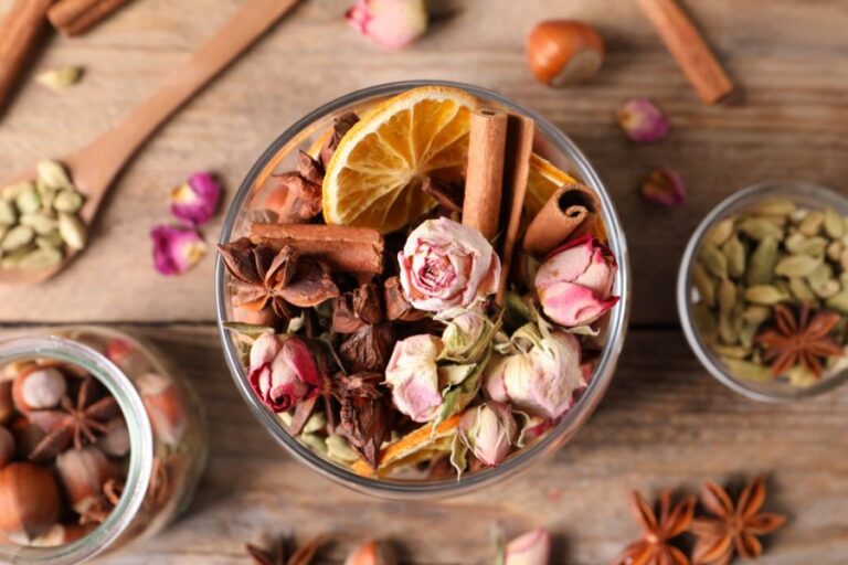 Jar of Potpourri With Various Spices, Dried Fruits, and Dried Flowers