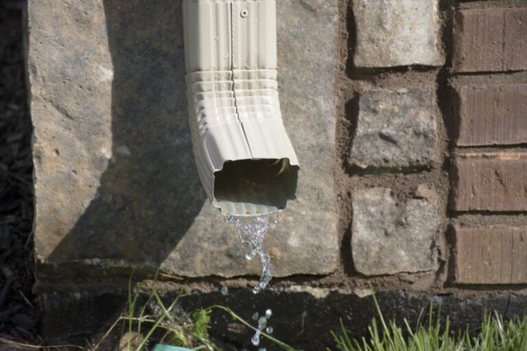 Closeup of a Downspout Draining Water