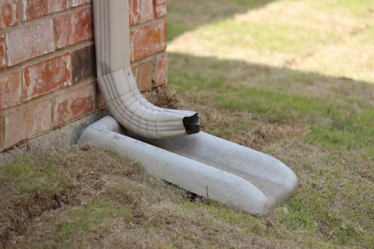 Downspout Emptying Water Into a Splash Block