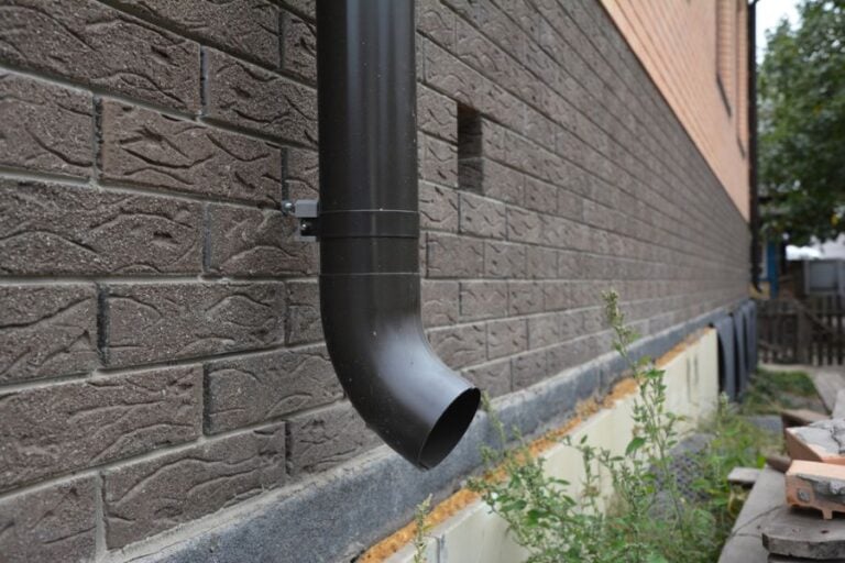 New Gutter System Downspout Draining Away From Home Foundation