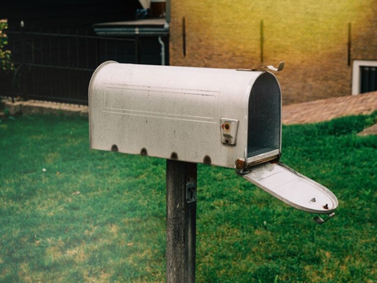 Side View of an Open Gray Mailbox