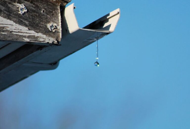 Water Dripping From a Gutter