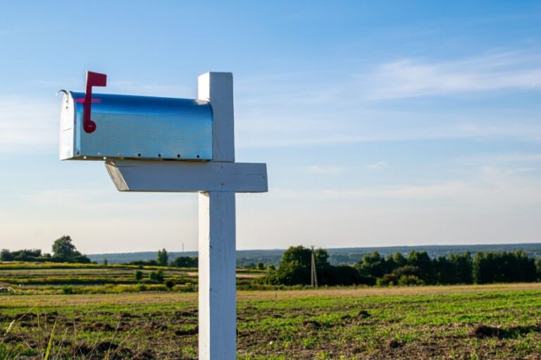 White Mailbox Alongside the Road in the Country