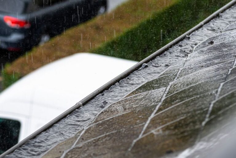 Clogged Rain Gutter Filled With Water