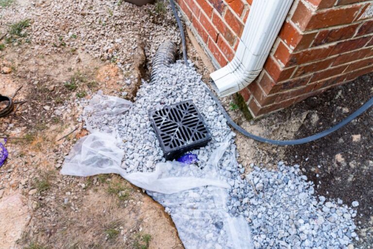 French Drain System Installed Under a Drainspout