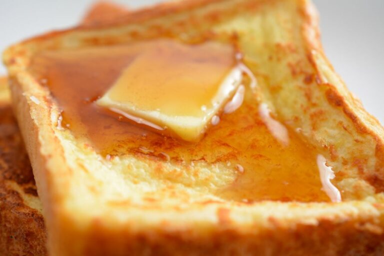 Closeup of French Toast With Syrup and Butter
