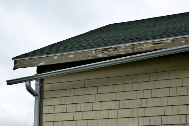 Gutters on House Pulling Away and Broken