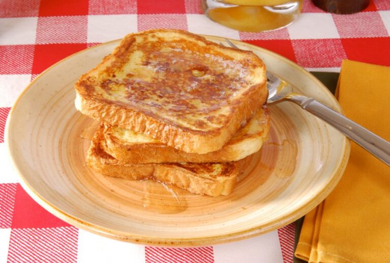 Plate of Golden Brown French Toast With Syrup for One