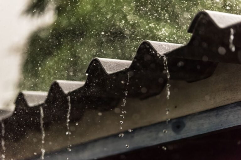 Rain Running Off of a Roof Without Gutters