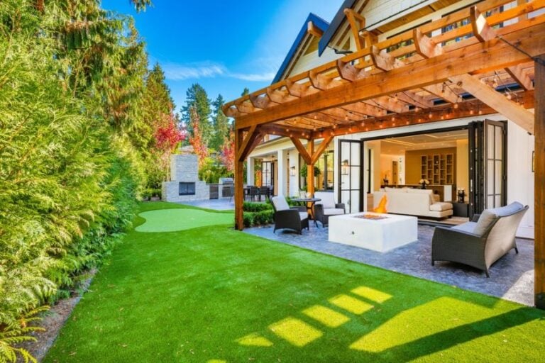Beautiful Backyard Pergola With a Fire Pit and Outdoor Furniture