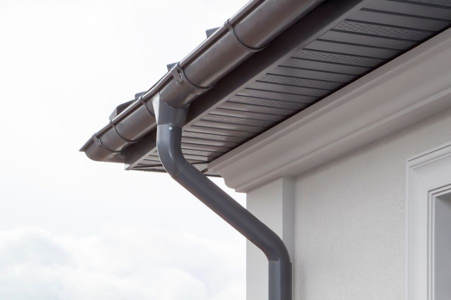 Downspout Coming Down Off of New Gutters