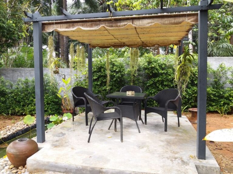 Metal Pergola Over a Patio in the Backyard