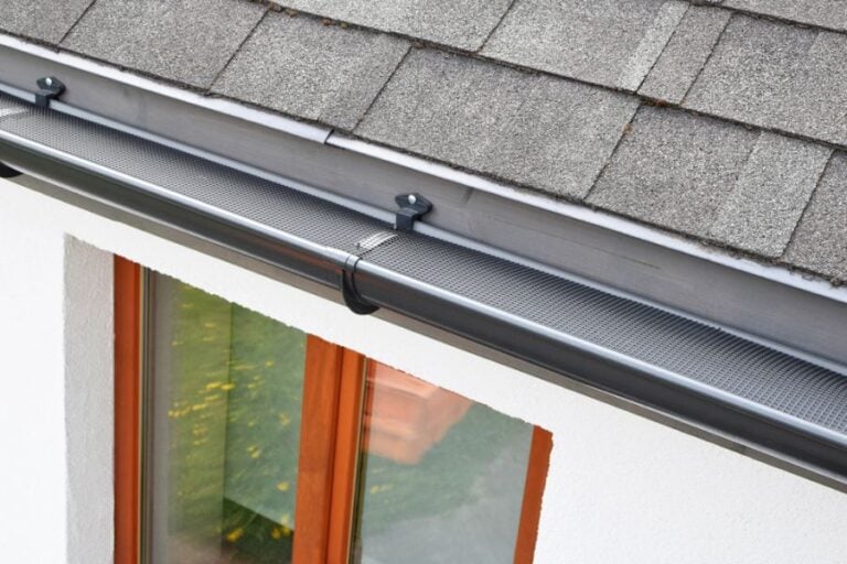 New Dark Grey Gutters on a House