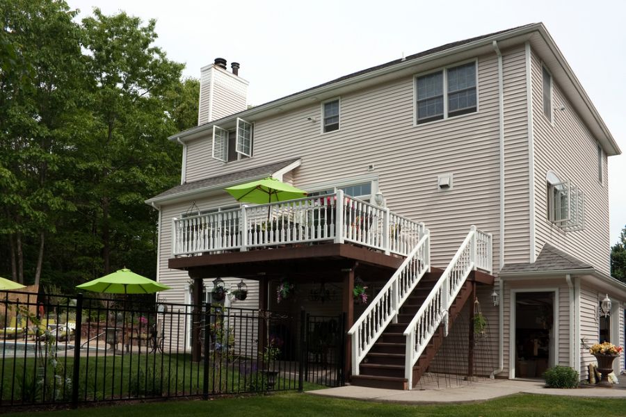 Raised Deck on the Back of a Two Story House With a Walkout Basement
