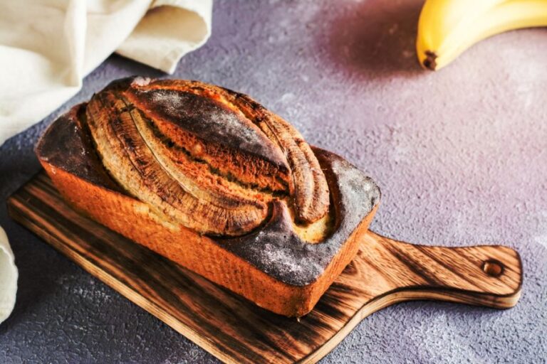 Burnt Banana Bread on a Cutting Board