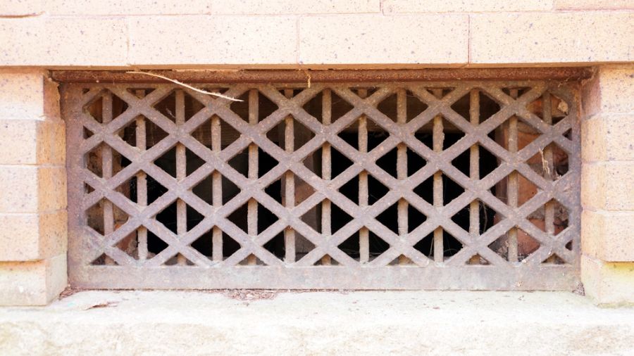 Metal Vent Grate in to a Crawl Space