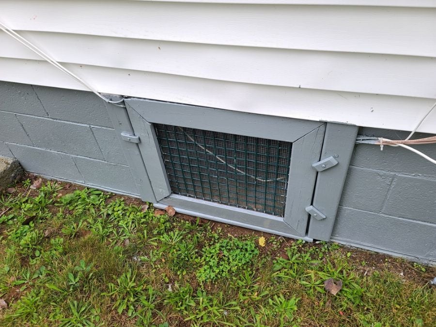 Small Door Covering the Entrance to a Crawl Space