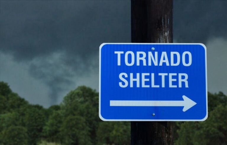Tornado Shelter Sign With Storm in the Background