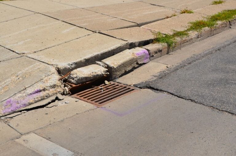 Sidewalk Buckling and Curb Damage